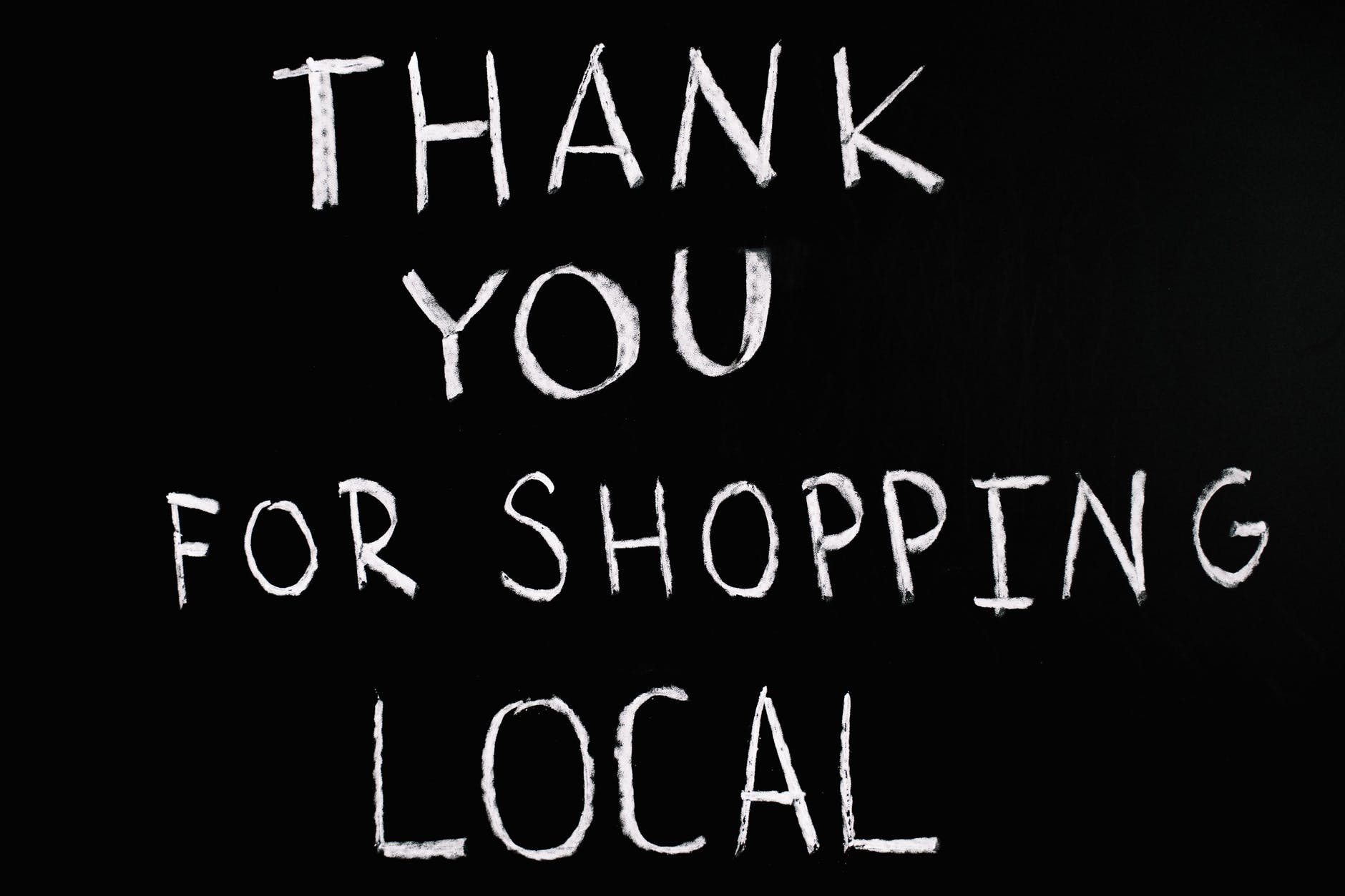 thank you for shopping local lettering text on black background